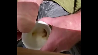 Wank in public cafe give cum in cup